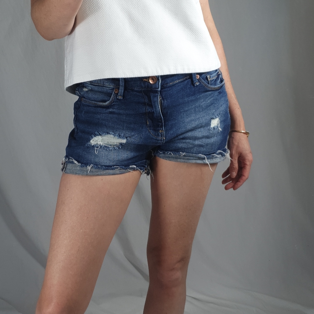 Denim jeans cutoff shorts with distressing